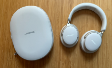 A pair of Bose QuietComfort Ultra headphones on a table