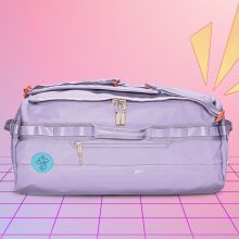 baboon to the moon duffel bag on purple geometric background