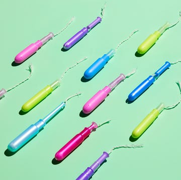 a group of colored tampons