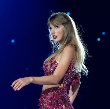 taylor swift dances during the opening night of the eras tour