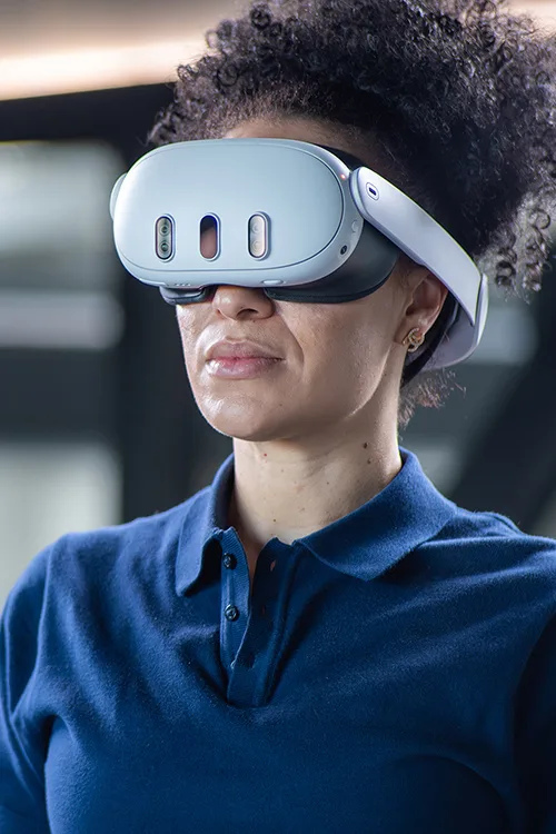 Confident Engineer in White Shirt Working on Jet Engine with Use of Augmented Reality Hologram in an Office at Plane Assembly Plant. Industrial Specialist Working in Technological Development Facility