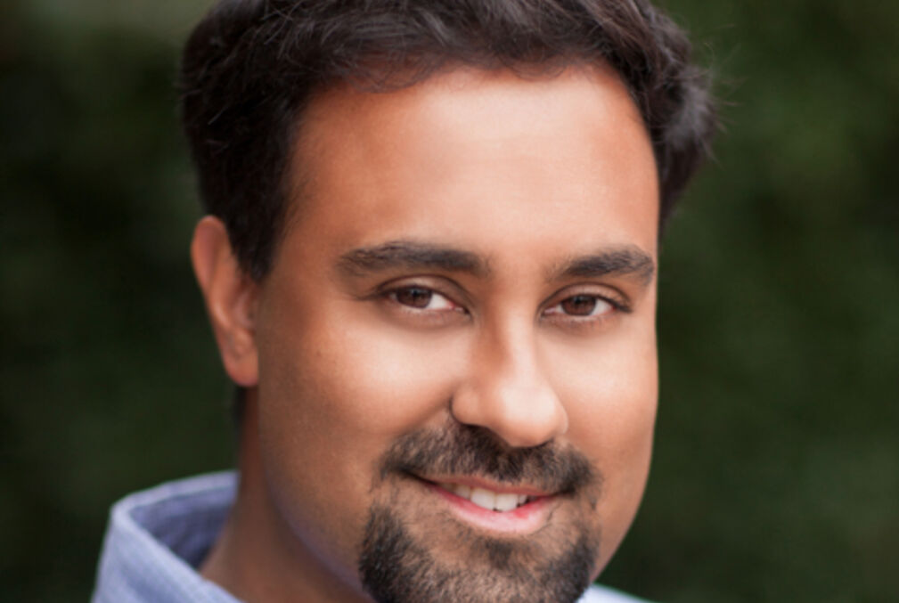 Photo of Surya Ganguli wearing a light-blue collared shirt