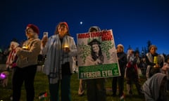 People hold a vigil for Aysenur Ezgi Eygi