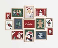 a group of christmas cards hanging on the wall with santa claus and other holiday related items