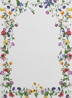 a watercolor painting of colorful flowers on white paper with space in the middle for text