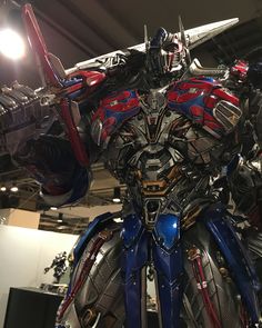 a giant robot that is on display in a building