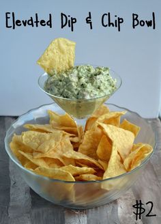 a bowl filled with chips and guacamole dip