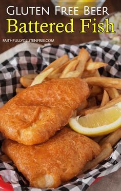 fish and fries are served in a basket with lemon wedges on the side that says gluten free beer battered fish