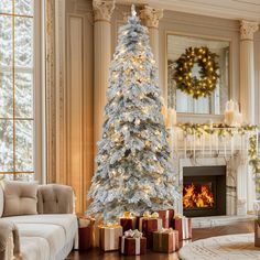 a living room with a christmas tree and presents in front of the fire place,