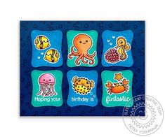 an ocean themed birthday card with sea animals and words on the front, in blue