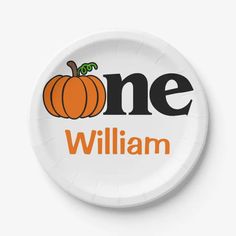 a paper plate with an orange and black pumpkin on the front that says, one william