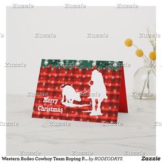 a red and green christmas card with a dog on it