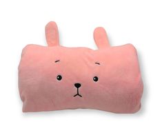 a pink pillow with a black nose and ears on the front, it is shaped like a bear