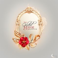 an elegant golden frame with red flower on it