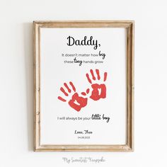 a father's day card with handprints on it and the words daddy written in red