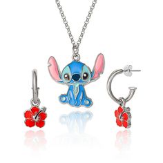 a necklace and earring set with a cartoon character on it