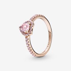 Add a sophisticated touch to your look with the Sparkling Elevated Heart Ring. The ring draws inspiration from the classic Pandora Timeless collection. Hand-finished in 14k rose gold unique metal blend, this piece features a pink heart-shaped central, elevated stone. Clear cubic zirconia create the halo and decorate half of the ring band, with the Pandora logo inside the shank. Stack this ring with hand-finished styles in sterling silver for a statement mixed metal look. - Pandora Sparkling Elev Elevated Heart Ring, Pandora Rings Heart, Pandora Logo, Heart Promise Rings, Pandora Pink, Xmas List, School Nails, Short Acrylic, Jewelry Accessories Ideas