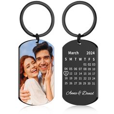 an engraved key chain with a photo on it and a date printed on the front