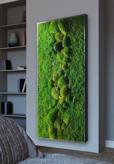 a green moss covered wall in a bedroom