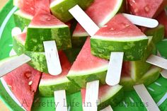 slices of watermelon and popsicles with toothpicks