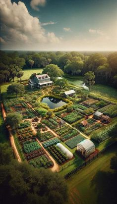 an aerial view of a large garden with lots of trees and plants in the foreground