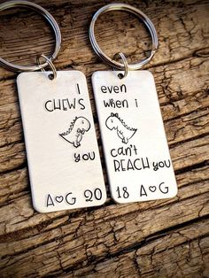 two personalized key chains with the words, i chew when you can't reach for