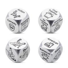 four metal dices with different types of stickers on the front and back of them