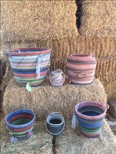 several baskets stacked on top of hay bales