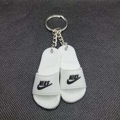 Designer Shoes 3d Keychain Nike White Slides Shoes Measures Apprx 5.5*2cm (2.17 0.79 Inches). 0.79 Inches Is The Width For Both Shoes Next To Each Other. Made From A Soft Pvc Rubber. This Listing Is For One Keychain With White Nike Charms. Ships From Pennsylvania Usa Don't Have A Poshmark Account? Sign Up With Code Kvolz84 To Get A $10 Shopping Credit. Nike Keychain, White Polo Men, 3d Keychain, Rubber Keychain, Soccer Shin Guards, Gold Gloves, White Slides, Nike Slides, Nike Bags