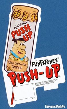 an advertisement for push up toothpaste on a blue background with the word push - up written below it