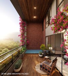 the balcony is decorated with pink flowers and potted plants