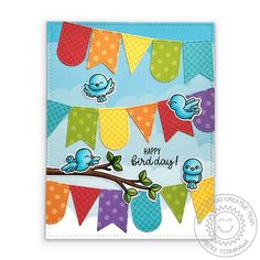 a birthday card with two birds on a branch and bunting flags in the background