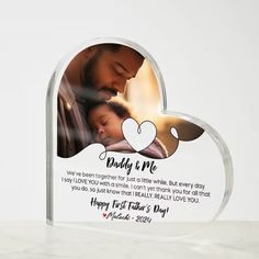 a heart shaped photo frame with the words daddy and me printed on it