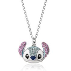 Embrace Disney magic with the Stitch Pave Pendant Necklace. Sparkling crystals adorn the pendant, capturing the whimsy of Stitch. The 16+3" silver chain adds versatility to your style, making it a perfect gift for any Disney fan. Stitch Merch, Cheer Necklace, Stitch Room, Disney Princess Jewelry, Stitch Accessories, Stitch Things, Rosé Core, Stitch Necklace, Lilo And Stitch Merchandise