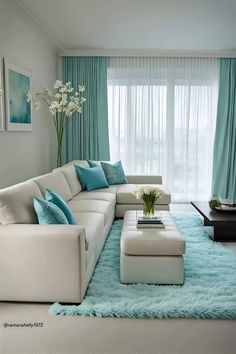 a living room with blue and white decor