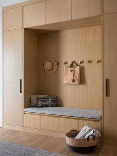 a room with wooden cabinets and a bowl on the floor