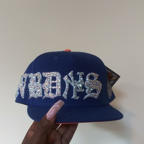 Custom Mix Size Full Bling Out Crystal Famous Nobody's Old English Embroidery Snapback Hat. Super Detail. 2 Other Colors Also Available, Hats Are Made To Order (This One Is Ready To Ship), Please Allow 2 Weeks To Ship For Custom Orders. Personal Hat, I Wasn't Looking To Sell But Only Willing To Sale For Asking Price. Price Includes The Cost Of This Limited Edition Twenty Two X Famous Nobody Hat (X Marks The Spot). Video Taken Without Flash. These Pics Doesn't Do This Hat Any Justice. Cool Fitted Hats, Custom Fitted Hat, Fitted Hats Women, Hats With Ears, Customized Hats, Rhinestone Hat, English Embroidery, Custom Fitted Hats, Swag Hats