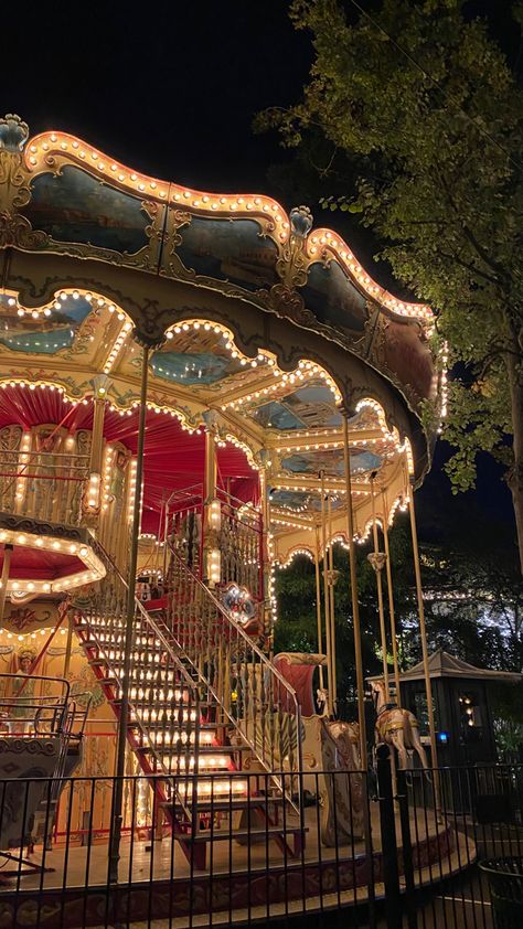 Lit carousel at Tivoli Gardens in Copenhagen. Hamburg, Hamburg Christmas, Copenhagen Denmark Aesthetic, Denmark Aesthetic, Tivoli Gardens Copenhagen, Tivoli Copenhagen, Copenhagen Aesthetic, Danish Aesthetic, Aesthetic Lights