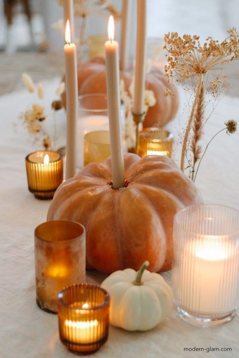 Oct 10, 2021 - These DIY Pumpkin Candle Holders are made with heirloom pumpkins and they make a beautiful centerpiece for your fall table. Thanksgiving Table Settings, Diy Pumpkin Candle, Table Halloween, Pumpkin Candle Holder, Fall Brunch, Friendsgiving Dinner, Fall Dinner Party, Fall Thanksgiving Decor, Pumpkin Candles