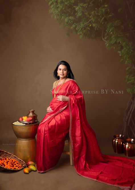 "Embracing motherhood the traditional way – where elegance meets maternity. 🌼🤰 #IndianMaternity #TraditionAndMotherhood #BumpAndBeauty" Traditional Maternity Shoot In Saree, Maternity Photoshoot Ideas At Home Indian, Maternity Photography Indian Traditional, Maternity Photography Poses Indian Indoor, Indian Traditional Maternity Photoshoot, Maternity Shoot Traditional, Maternity Photo Shoot Indian, Indian Maternity Photos In Saree, Maternity Photo Shoot Ideas Indian