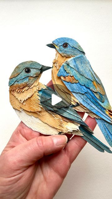 Sarah Suplina on Instagram: "Taking a break from my State Bird series to create a custom piece for a first anniversary- the paper anniversary - what a special gift for each other 💕 

#artreels #artvideo #paperart #birdart #bluebirds #arttechniques #artlife #createeveryday #makeart #paperanniversary" Tela, Blue Bird Craft, Paper Birds Craft, Quilted Birds, Paper Birds Diy, Color Wheel Art Projects, Bird Paper Craft, 3d Art Painting, Watercolour Bird