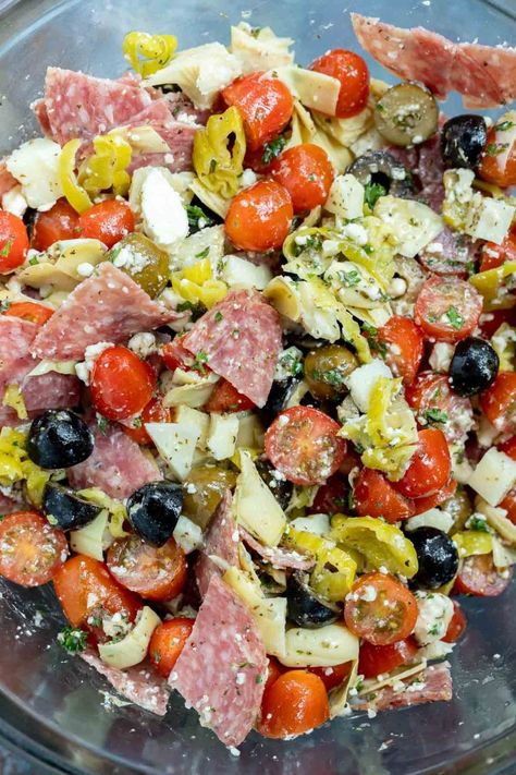 This Low Carb Antipasto Salad Recipe is great for lunch, dinner, snacks or meal prep. A Keto friendly salad that can be in the fridge waiting for you when hunger strikes. Filled with salami, cheese, tomatoes, olives and artichokes for a flavorful and filling meal. #antipasto #lowcarbrecipes #ketorecipes #lowcarb #keto #saladrecipes Essen, Mediterranean Salad Recipes, Antipasto Salad Recipe, Salad Meals, Antipasto Salad, Dinner Snacks, Fresh Salad Recipes, Mediterranean Salad, Best Salad Recipes