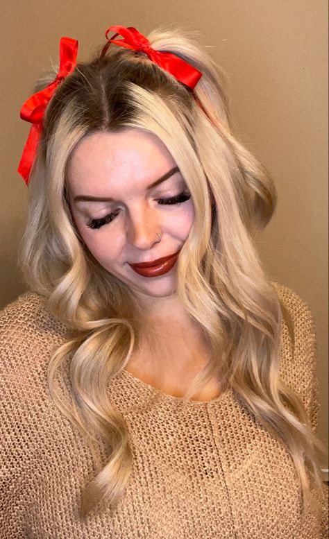 Woman with ribbons in hair Holiday Headband Hairstyles, Christmas Hair Extensions, Christmas Program Hairstyles For Kids, Holiday Bow Hairstyle, Hair Bow Ideas Style, Christmas Hair With Ribbon, Christmas Hair For Women, Kid Christmas Hairstyles, Christmas Hairstyles With Bow