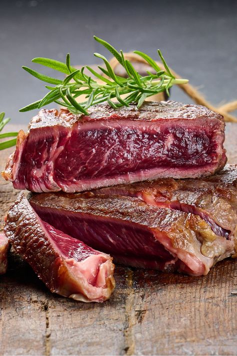 blue rare steak sliced on a wood cutting board Blue Rare Steak, Rare Meat, Blue Steak, Kinds Of Steak, Broiled Steak, Medium Rare Steak, Rare Steak, Meat Lover, Italian Meats