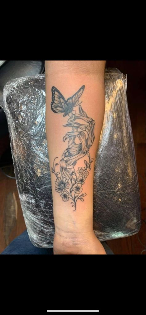 Skeleton Hand Holding Butterfly Tattoo, Blended Patchwork Tattoo, Skeleton Hand Holding Butterfly, Hand And Butterfly Tattoo, Hippie Sleeve Tattoo, Unique Forearm Tattoos For Women, Hand Holding Butterfly, Arm Tats For Women, Women Half Sleeve Tattoo