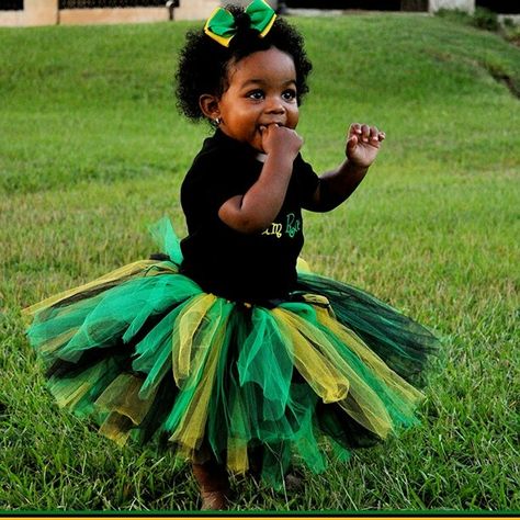 jamaican baby outfits | little Jamaican princess. ') Tutus, Exotic Baby Names, Jamaican Girls, Jamaica Outfits, Yellow Tutu, Flag Dress, Jamaican Culture, The Kinks