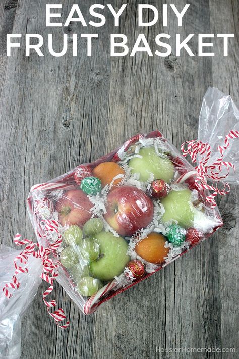 Making Fruit Baskets Gift Ideas, Christmas Fruit Gift Ideas, Fruit Basket Gift Ideas Diy, Homemade Fruit Baskets Gift Ideas, Diy Fruit Gift Basket, How To Make A Fruit Basket Gift, Christmas Fruit Basket Ideas Gift, Fruit Wrapping Ideas, Christmas Fruit Basket Ideas