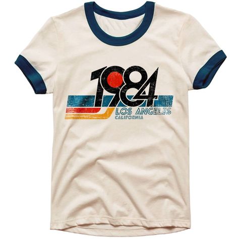 A Nostalgic Tribute To The Iconic Year Of 1984 In Los Angeles, California In Natural And Navy Color . Crafted With Care, This Ringer Tee From Artree Design Combines Classic Design Elements With A Touch Of Vintage Charm. Made From High-Quality Cotton, Our Ringer T-Shirt Offers A Comfortable And Breathable Fit. 90s Shirts Graphic Tees, Vintage Shirt Design, 70s T Shirts, School Shirt Designs, 70s Shirts, Retro Graphic Tees, 90s Shirts, 90s 80s, Graphic Tees Vintage