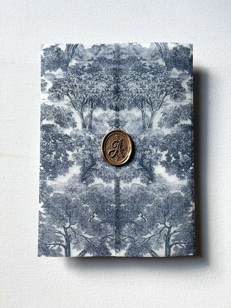 This listing is for VELLUM WRAPS that will work with 5x7 invitations and fit inside A7 envelopes. The design is a blue French toile design that is a lovely touch to any elegant wedding invitation suite.  Wax seal sold separately. ORDERING 1. Select the correct wrap quantity in the first dropdown menu. 2. Add the item to your cart and complete your purchase. Please don't hesitate to reach out to me via Etsy Messenger with any questions you may have! ADDITIONAL INFORMATION - Vellum wraps orders will ship within 7 business days. - All vellum wrap orders will cost $4 to ship domestically. - Wraps will come pre folded and ready to use. - Please note that a slight curl to the vellum may be present. Once assembled, they will lay flat. - Please note that ink colors vary depending on your computer Floral Vellum, Printed Vellum, Blue And Blush Wedding, Dark Blue Wedding, Vellum Wrap, Toile Design, French Toile, Blue Toile, Blue French