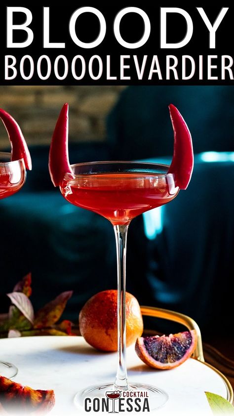 Halloween is the time for bloody and bitter cocktails and this easy Boulevardier riff is perfect as a single cocktail or batched as a Halloween drink. In this cocktail we take a classic Boulevardier, top it with blood orange soda and add a fun pepper garnish to give the whole thing some horns. | @cocktailcontessa #halloweencocktails #diyhalloweencocktailparty #fallcocktailparty #halloweenpartycocktails Orange Alcoholic Drinks, Fall Cocktail Party, Halloween Cocktail Party, Halloween Drinks Alcohol, Boulevardier, Halloween Drink, Drink Garnishing, Orange Cocktails, Homemade Cocktails